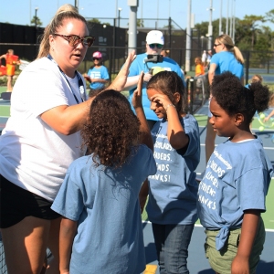 Sharing a high-five with the coach