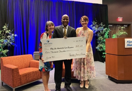 From (L-R) USTA Florida Section Foundation Director Dana Andrews, MaliVai Washington, USTA Florida Section Foundation Executive Director Alexis Johnson