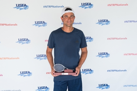 March 31, 2019 – Alex Bose holds the trophy after winning second place in the 5.0 division during the USTA NTRP Nationals 18 & Over Men’s & Women’s 3.0, 3.5,4.0, 4.5, 5.0 Singles at Academia Sanchez-Casal Florida in Naples, Florida.