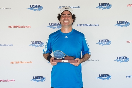 March 31, 2019 – Ara Toroyan holds the trophy after winning first place in the 3.5 division during the USTA NTRP Nationals 18 & Over Men’s & Women’s 3.0, 3.5,4.0, 4.5, 5.0 Singles at Academia Sanchez-Casal Florida in Naples, Florida.