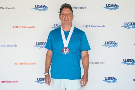 March 31, 2019 – Jerry Matteo with his medal after winning fourth place during the USTA NTRP Nationals 18 & Over Men’s & Women’s 3.0, 3.5,4.0, 4.5, 5.0 Singles at Academia Sanchez-Casal Florida in Naples, Florida.