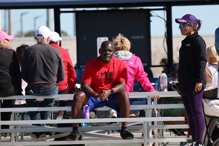 Kevin Sims watching his players on the court