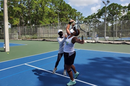 Niurka Sodupe teaching on the court