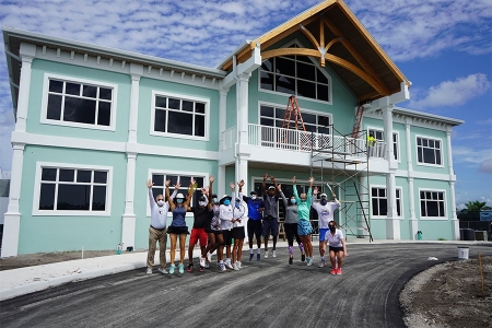The new Palm Beach Gardens Tennis Center Clubhouse with staff