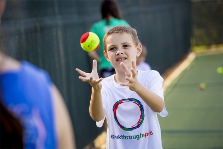 Speak Through Sports tennis clinic