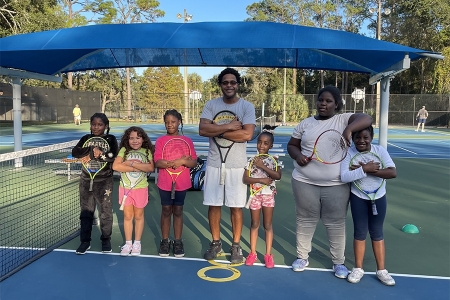 Play Tennis Gainesville Coach Chris Champion with tennis students