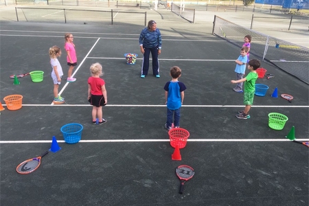 Kim Scullion on the court teaching