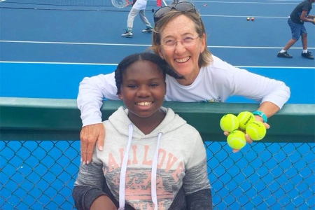 Kathy Reinmund with a student