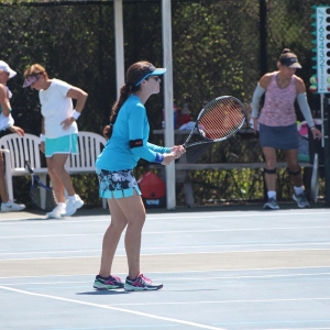 Miriam competing in the Women's Blast Off Doubles Tournament at the Racquet Club of Cocoa Beach