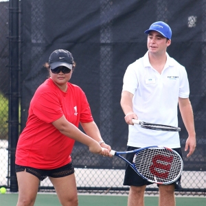 Travis Tressler taking part in a Wounded Warriors tennis event