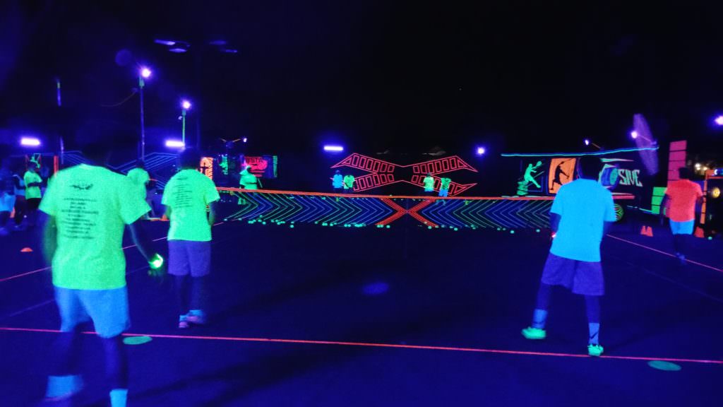 NO LIGHTS, NO CAMERA, BUT PLENTY OF ACTION: Glow in the dark tennis in Miami courtesy of XGLOsive.
