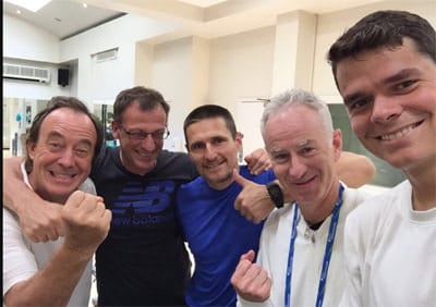 From right: Milos Raonic and John McEnroe