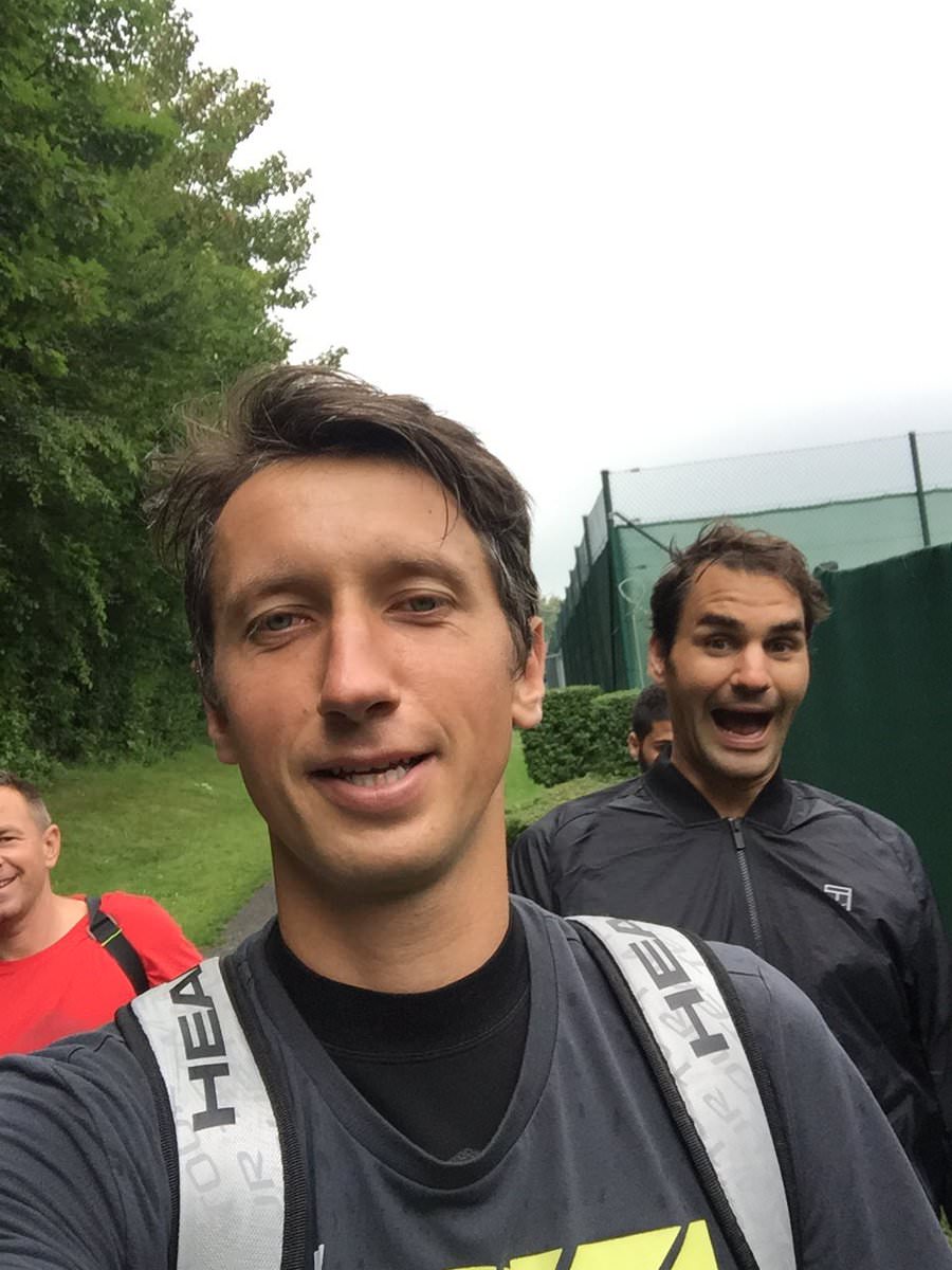 Roger Federer hams it up during a rain delay this week at Halle