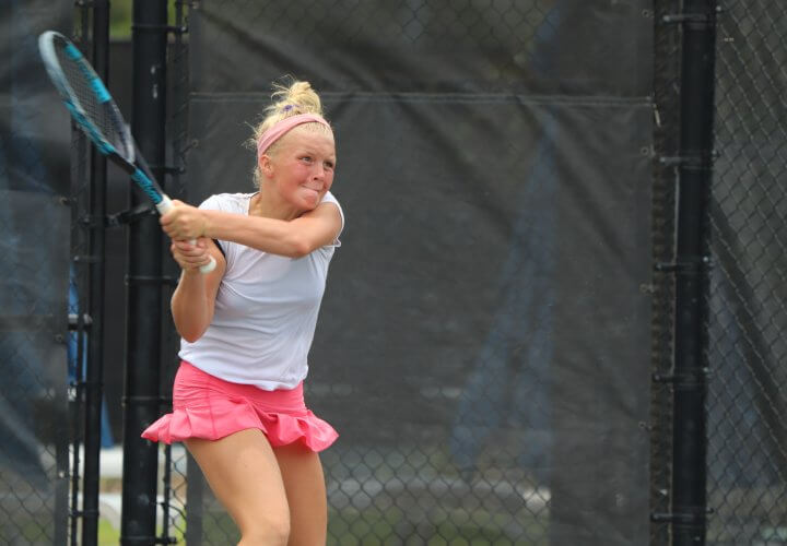 Girl Playing Tennis } USTA FL