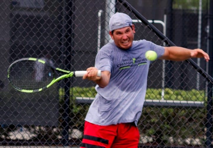 USTA FL | Tennis player returning a serve