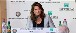 Mauresmo, in addition to needing a great many beverages during press conferences, is also the current French Fed Cup captain