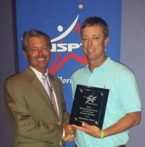 Michael Edge (r) receives USPTA-FL 2014 High School Coach of the Year from President Brad Leu.
