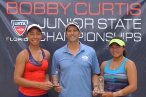 Mia Horvit (left) winning the Girls' 18s feed-in consolation at the Florida state junior championships